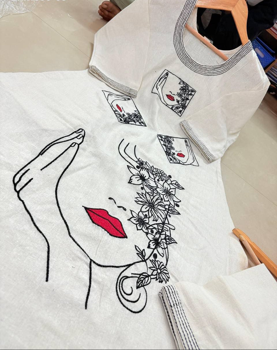 White garment with black floral and line art design on a white background
