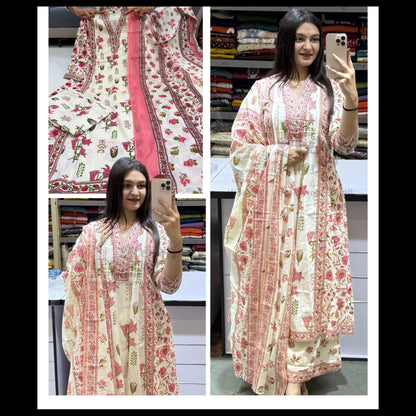 Woman wearing a floral dress in a fabric store
