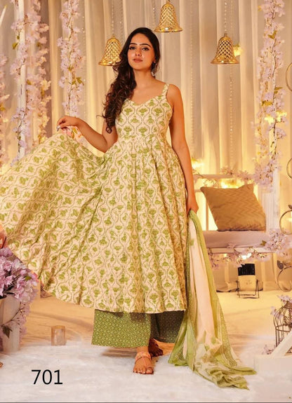 Woman in a green and white traditional outfit with a floral background