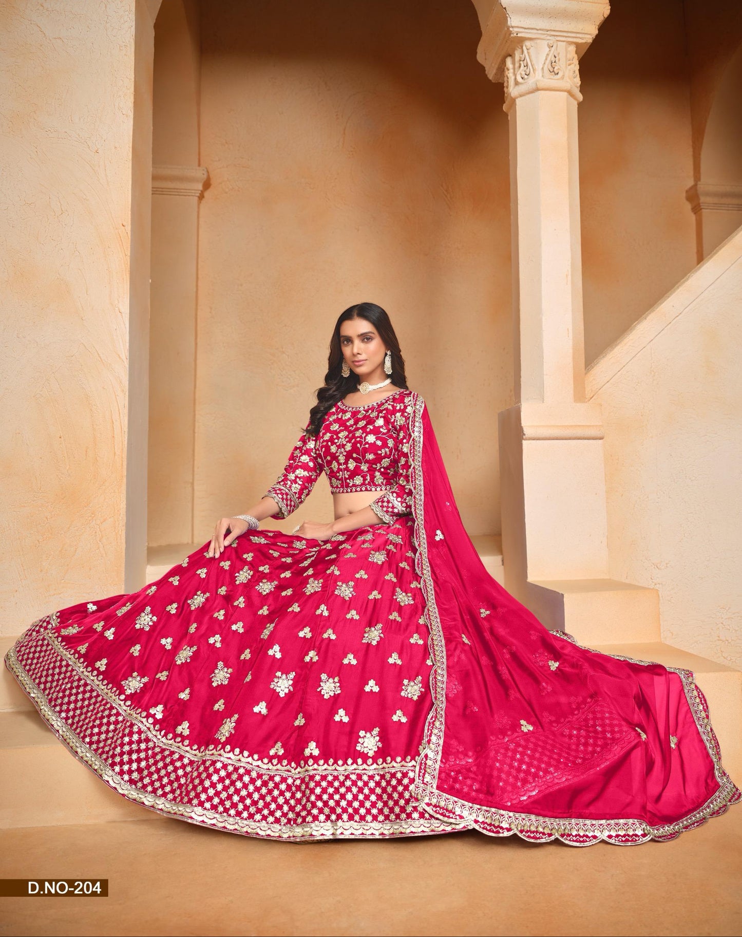 Woman in a red traditional outfit with white patterns in an architectural setting