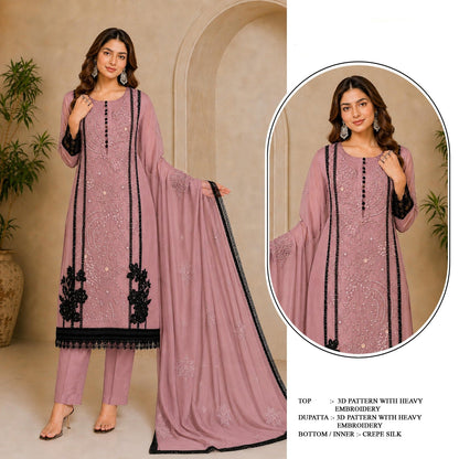 Woman modeling a pink outfit with black embroidery, featuring the brand 'Mah-E-Rooh'.
