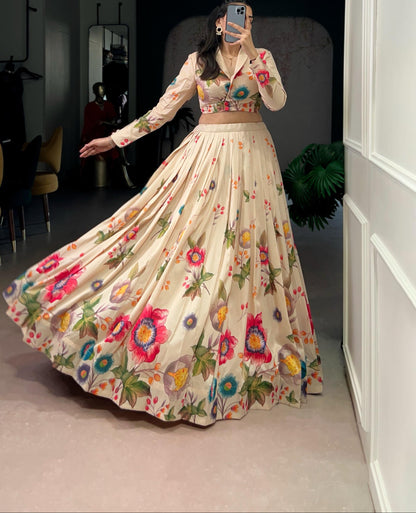 Person wearing a floral embroidered outfit taking a mirror selfie.